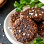 Beef Breakfast Sausage Patties Garnished with Herbs